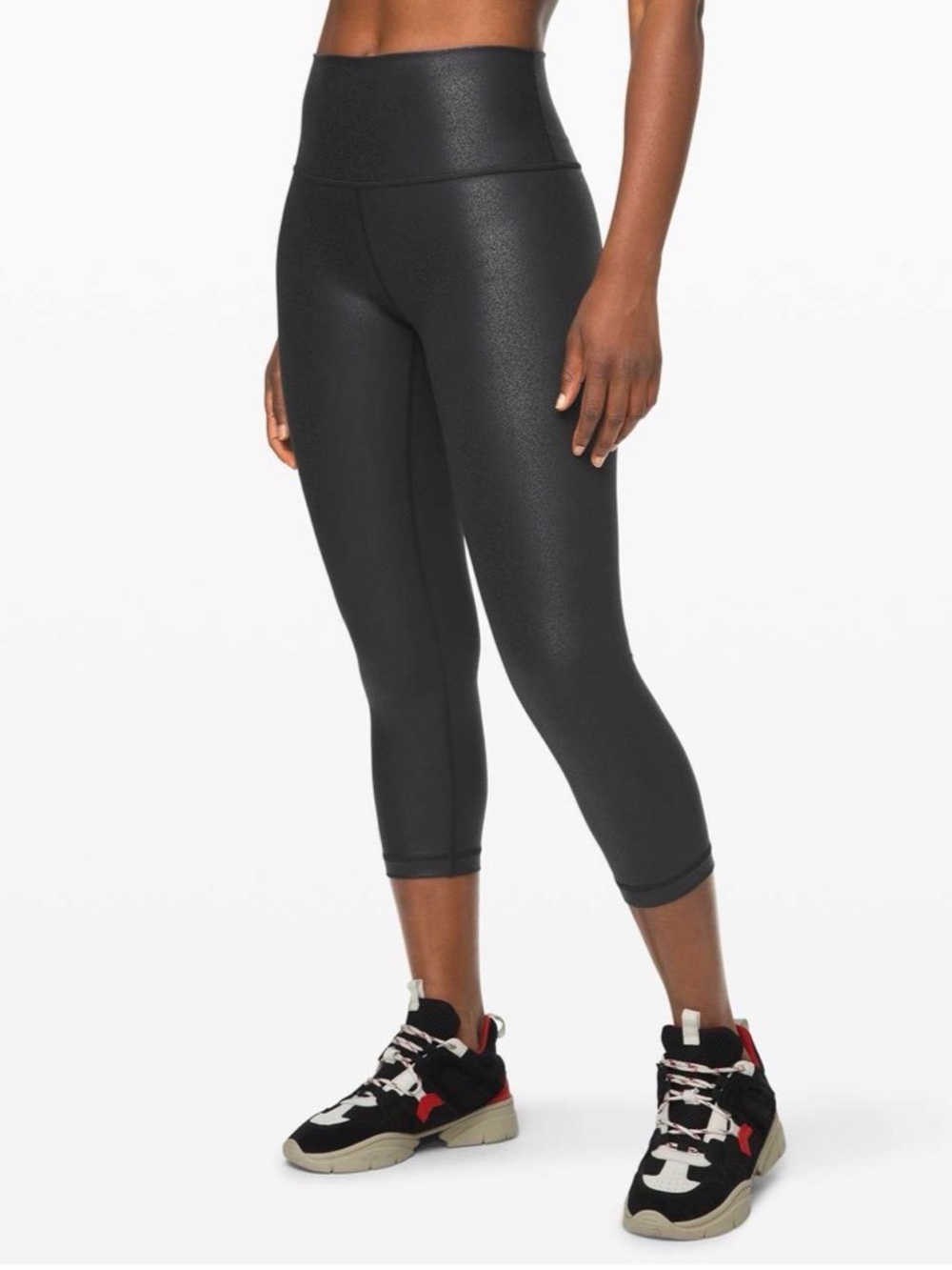 Lululemon wunder under crop high rise foil 21”. Size 4